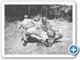 QUOTE: Carl executes a gun take-a-way and counters with a stomp to the knee. We used this knee break technique alot. My dad took this in N. Jackson, PA. We were training in a field behind his house.